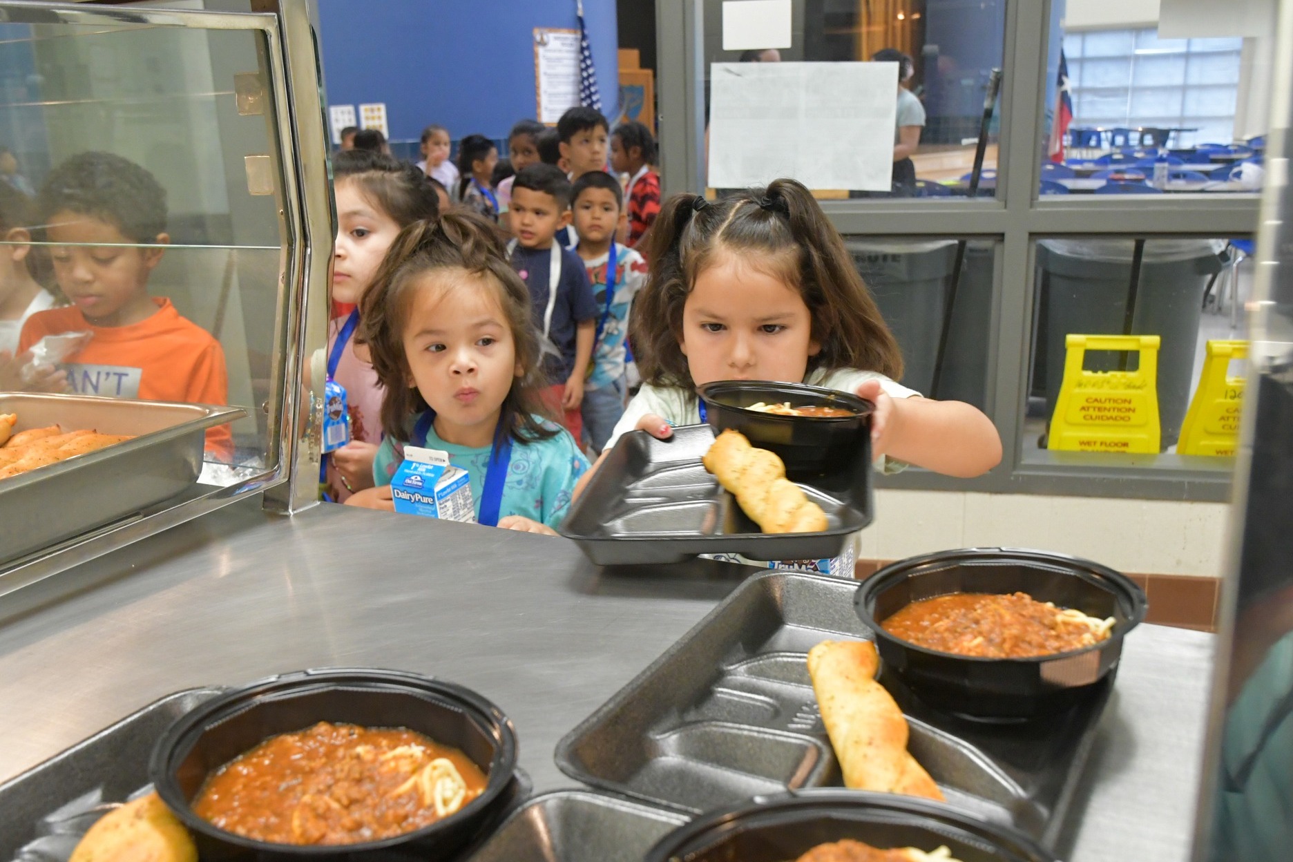 Students pick up meals at summer school
