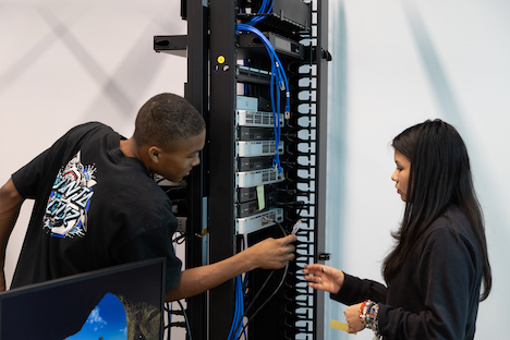 Sam Houston PTECH students work on routers