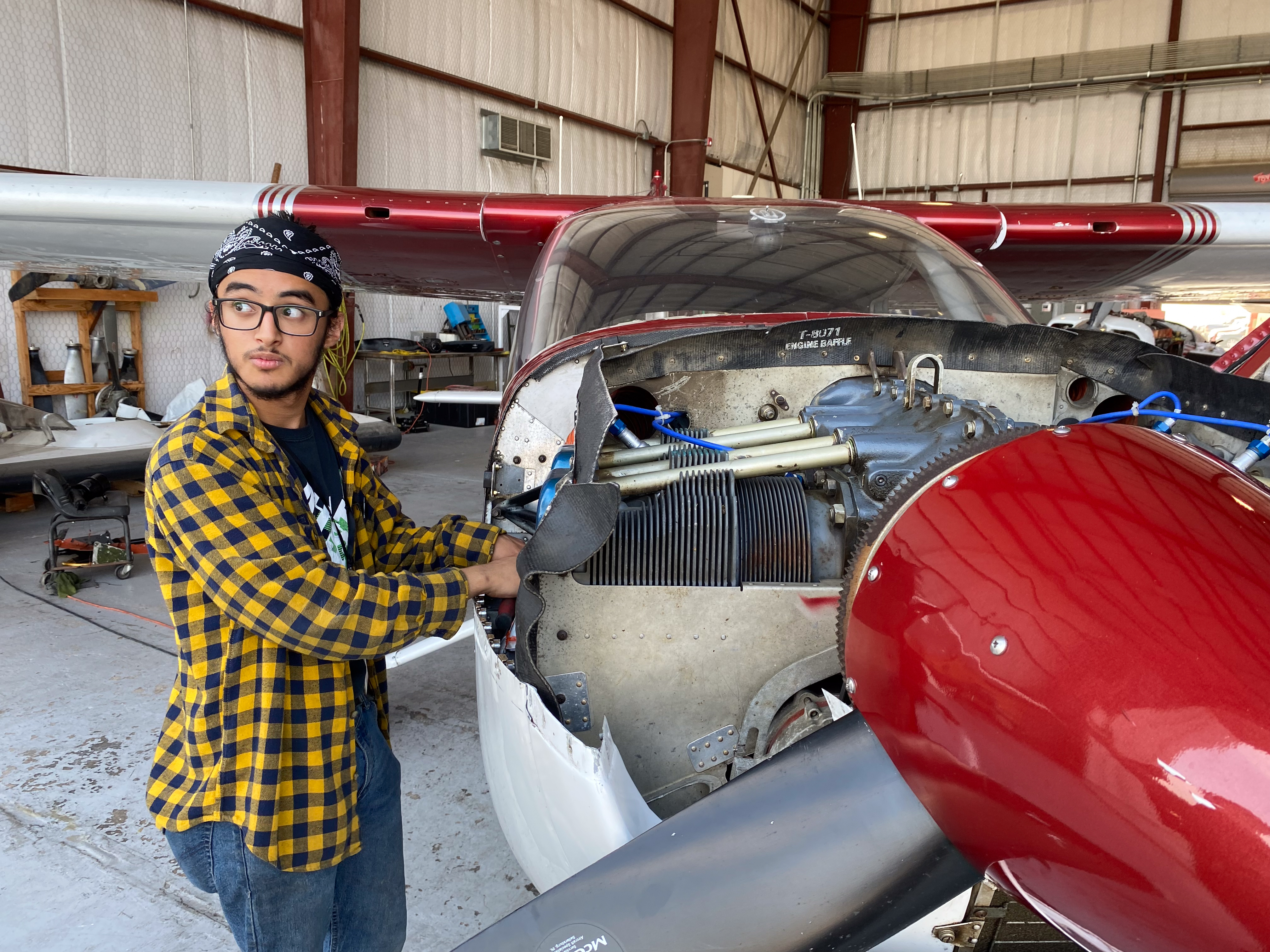 Soly works on an airplane
