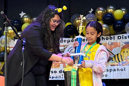 Spanish Spelling Bee Contestant Receives Prize