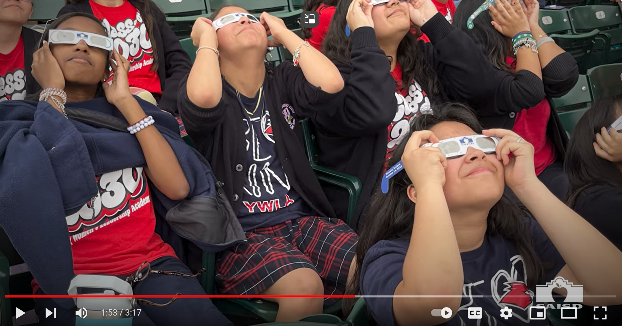 students watching eclipse