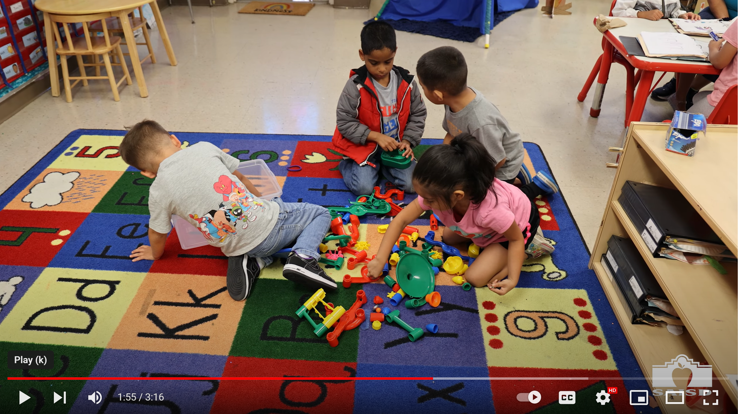 children playing in classroom