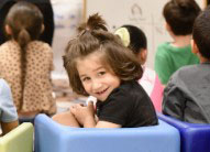 A little girl smiling