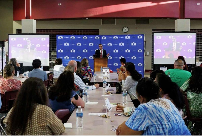 Superindendent Aquino speaking to at a neighborhood meeting