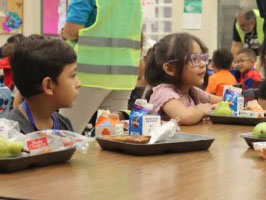 Students eating in a cafeteria