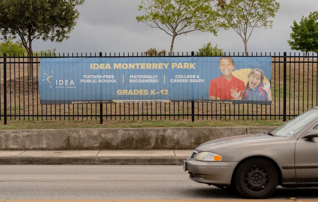 IDEA Schools sign on fence