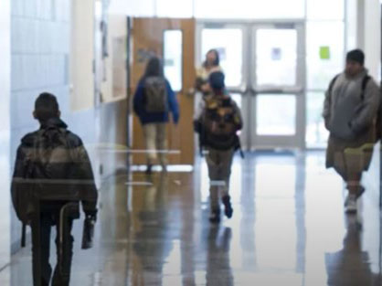 Students walking down a hallway