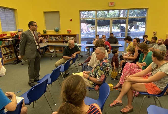 SAISD Superintendent Jaime Aquino speaking to community members