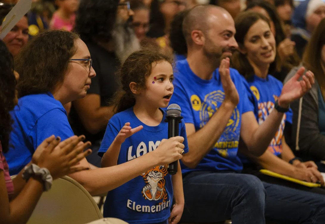 Student speaks at Neighborhood Meeting