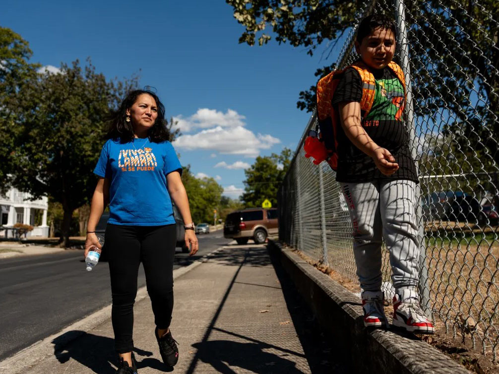 Mother walking with her son