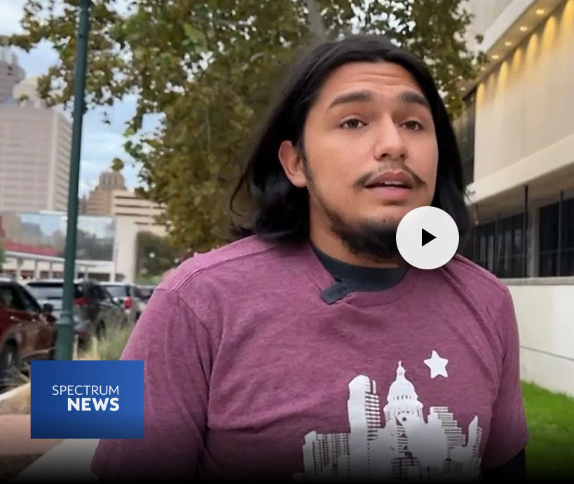 Student speaking to reporter outside of a school