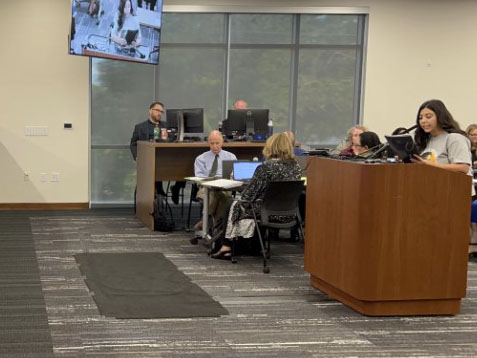 Woman speaking at an SAISD board meeting